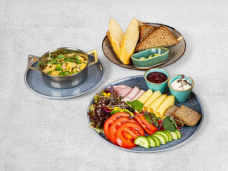 Warmia breakfast — cold cuts, cheeses, vegetables, bread